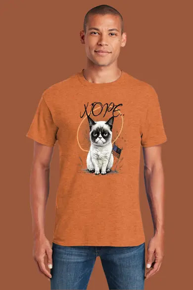 Person wearing an orange t-shirt with a cat graphic and 'NOPE' text on a brown background