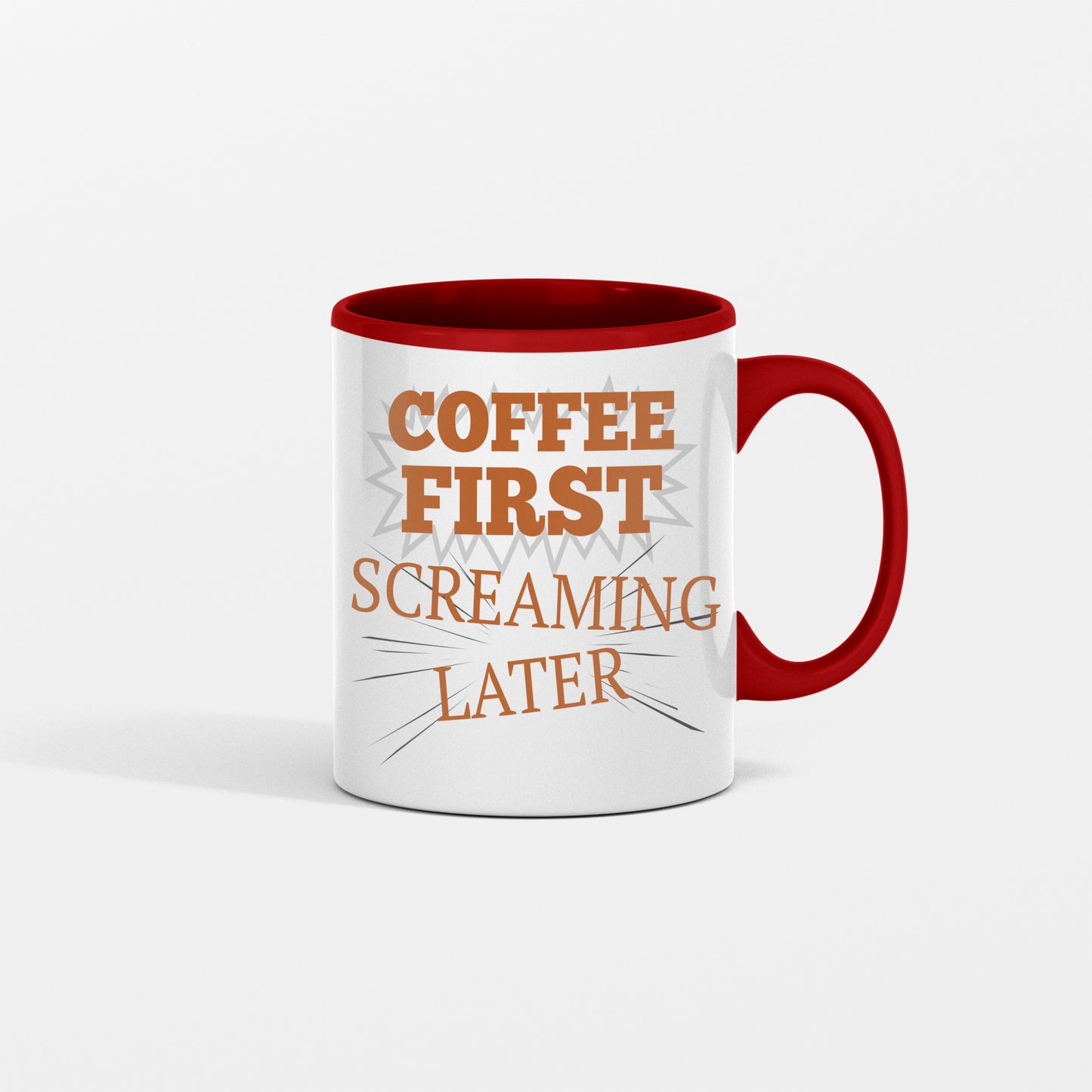 A white ceramic coffee mug with bold black text reading “COFFEE FIRST SCREAMING LATER” placed next to spilled beans and a frazzled notepad.