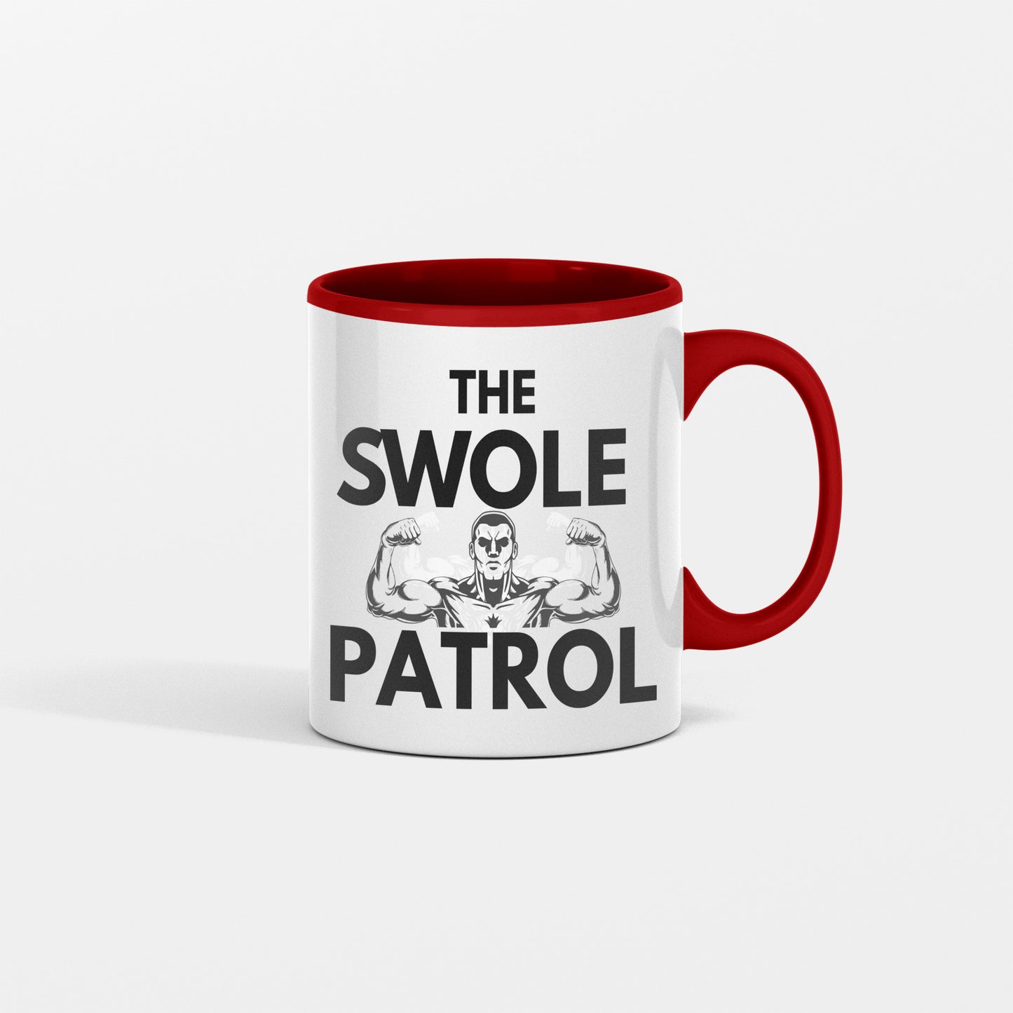 Swole Patrol Mug in matte black with bold logo, filled with steaming coffee, gym background