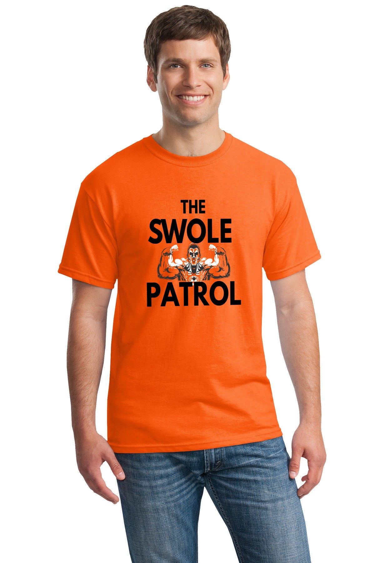 Athlete lifting weights wearing The Swole Patrol black performance T-shirt in industrial gym.