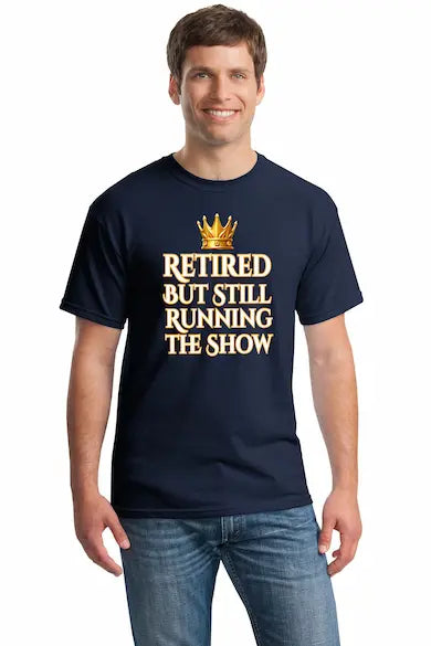Grandma and grandpa wearing "Retired But Still Running the Show" funny retirement T-shirt, smiling with confidence.
