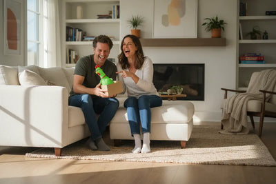 People laughing while opening a funny gift that creates lasting memories