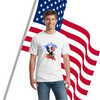 A patriotic graphic T-shirt with bold text reading “These Colors Don’t Run – Land of the Brave,” featuring American flag elements.
