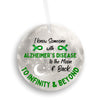Green ribbon ornament with “I Know Someone With Alzheimer’s Disease” text in elegant font, symbolizing love, awareness, and memory preservation.