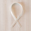 White awareness ribbon ornament reading “I KNOW SOMEONE WITH CROHN’S DISEASE” designed to support Crohn’s research and raise chronic illness awareness.