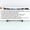“You Know You’re an Old Fart When funny aging plaque hanging on a rustic wooden wall”