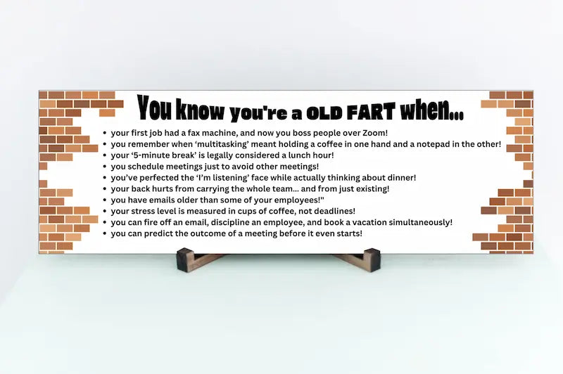 “You Know You’re an Old Fart When funny aging plaque hanging on a rustic wooden wall”