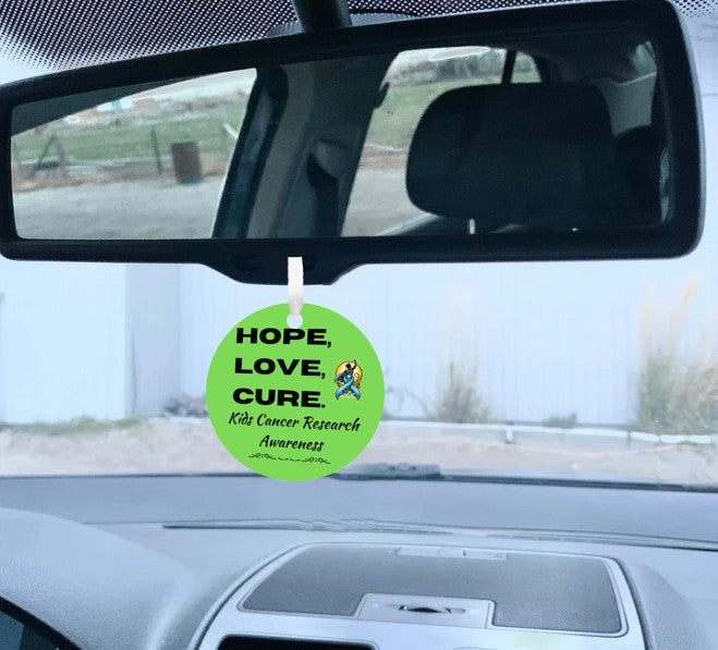 Colorful ribbon ornament with “HOPE, LOVE, CURE” text, supporting pediatric cancer awareness and research fundraising.