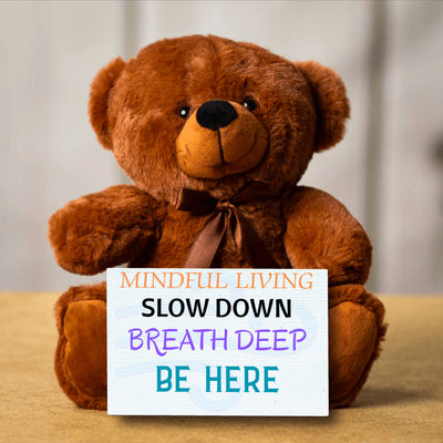 Minimalist design with the words “MINDFUL LIVING – SLOW DOWN – BREATHE DEEP – BE HERE” displayed in calming tones.