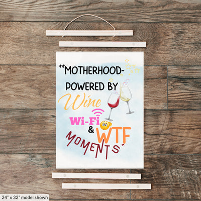 Funny Mother’s Day wall sign – “Motherhood Powered By Win, WiFi, & WTF Moments” hanging canvas quote décor for moms.

