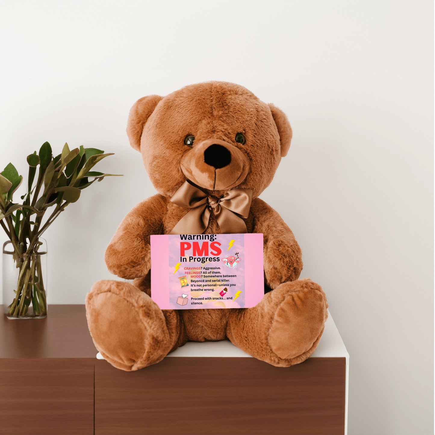 Bold comic-style PMS warning card with a pink storm background, cartoon icons like thunderclouds, chocolate bars, and explosive emojis, delivering a humorous and edgy message.