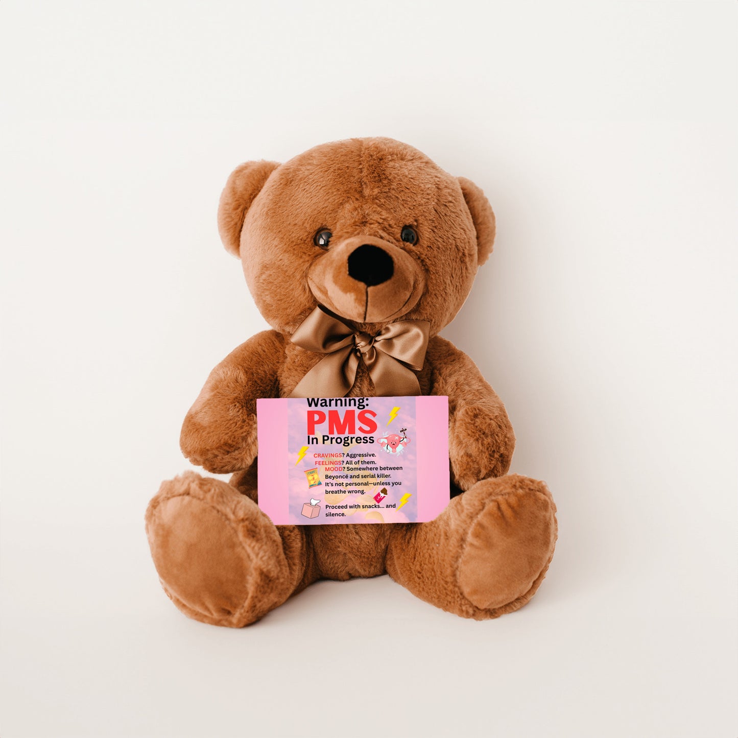 Bold comic-style PMS warning card with a pink storm background, cartoon icons like thunderclouds, chocolate bars, and explosive emojis, delivering a humorous and edgy message.