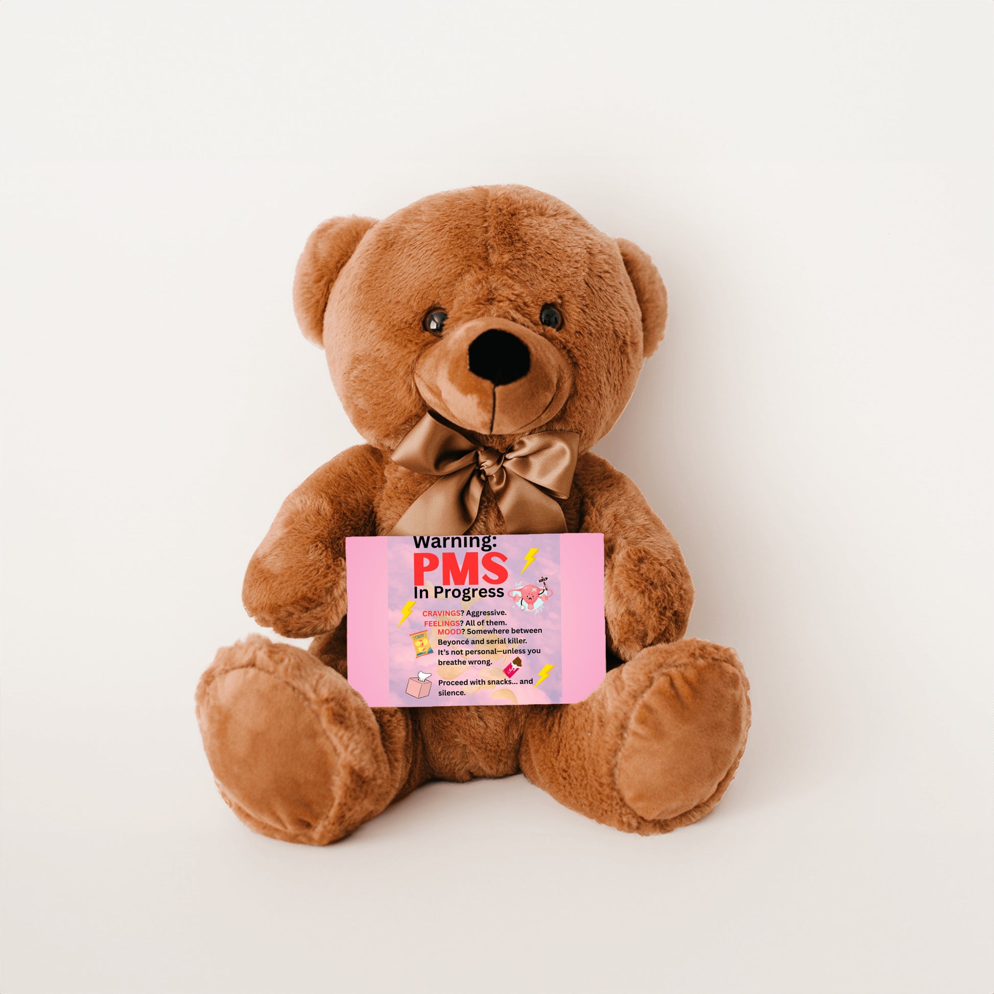 Bold comic-style PMS warning card with a pink storm background, cartoon icons like thunderclouds, chocolate bars, and explosive emojis, delivering a humorous and edgy message.