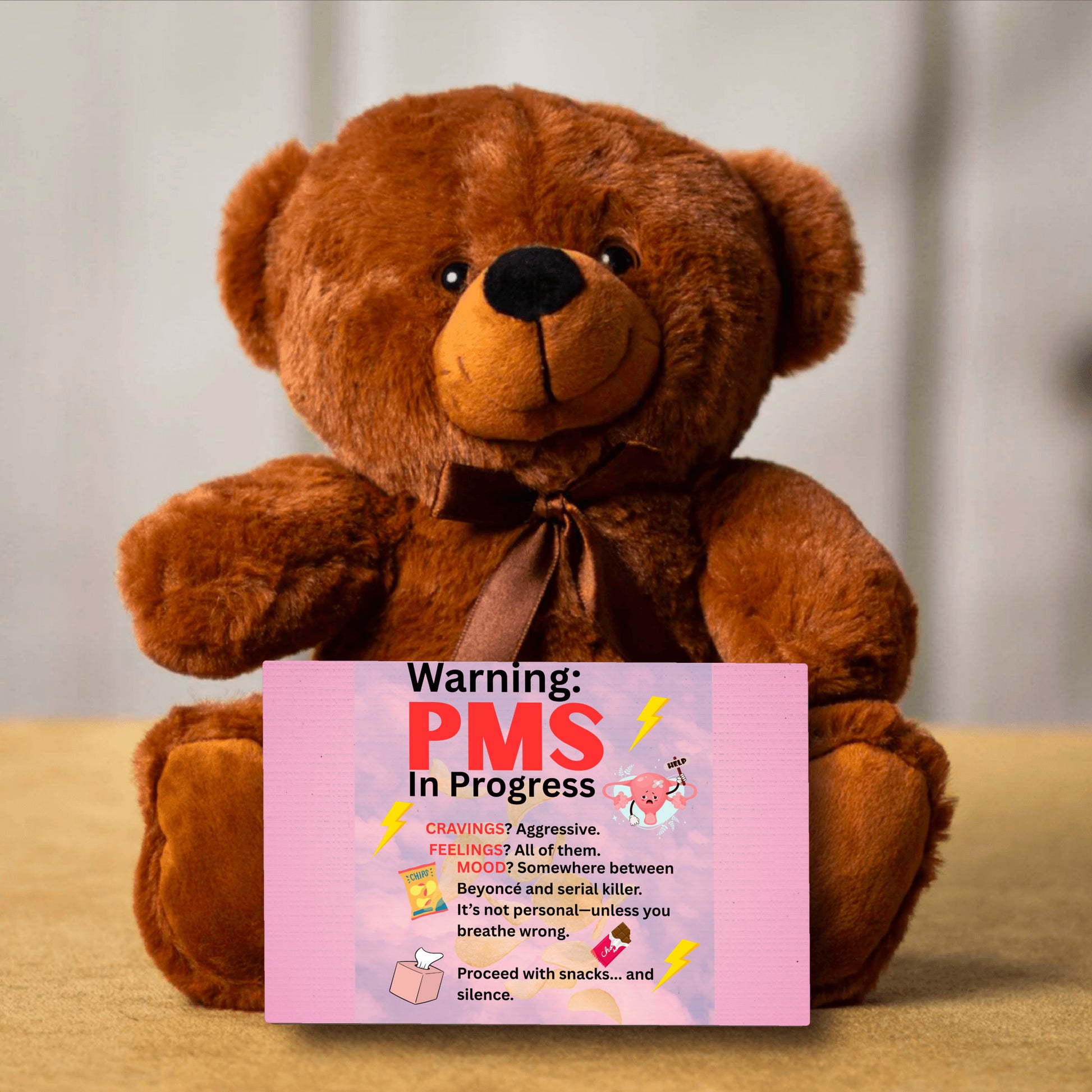 Bold comic-style PMS warning card with a pink storm background, cartoon icons like thunderclouds, chocolate bars, and explosive emojis, delivering a humorous and edgy message.