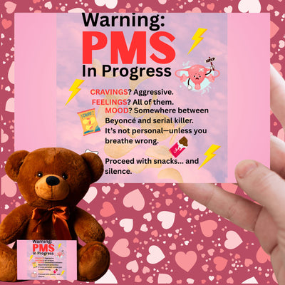 Bold comic-style PMS warning card with a pink storm background, cartoon icons like thunderclouds, chocolate bars, and explosive emojis, delivering a humorous and edgy message.