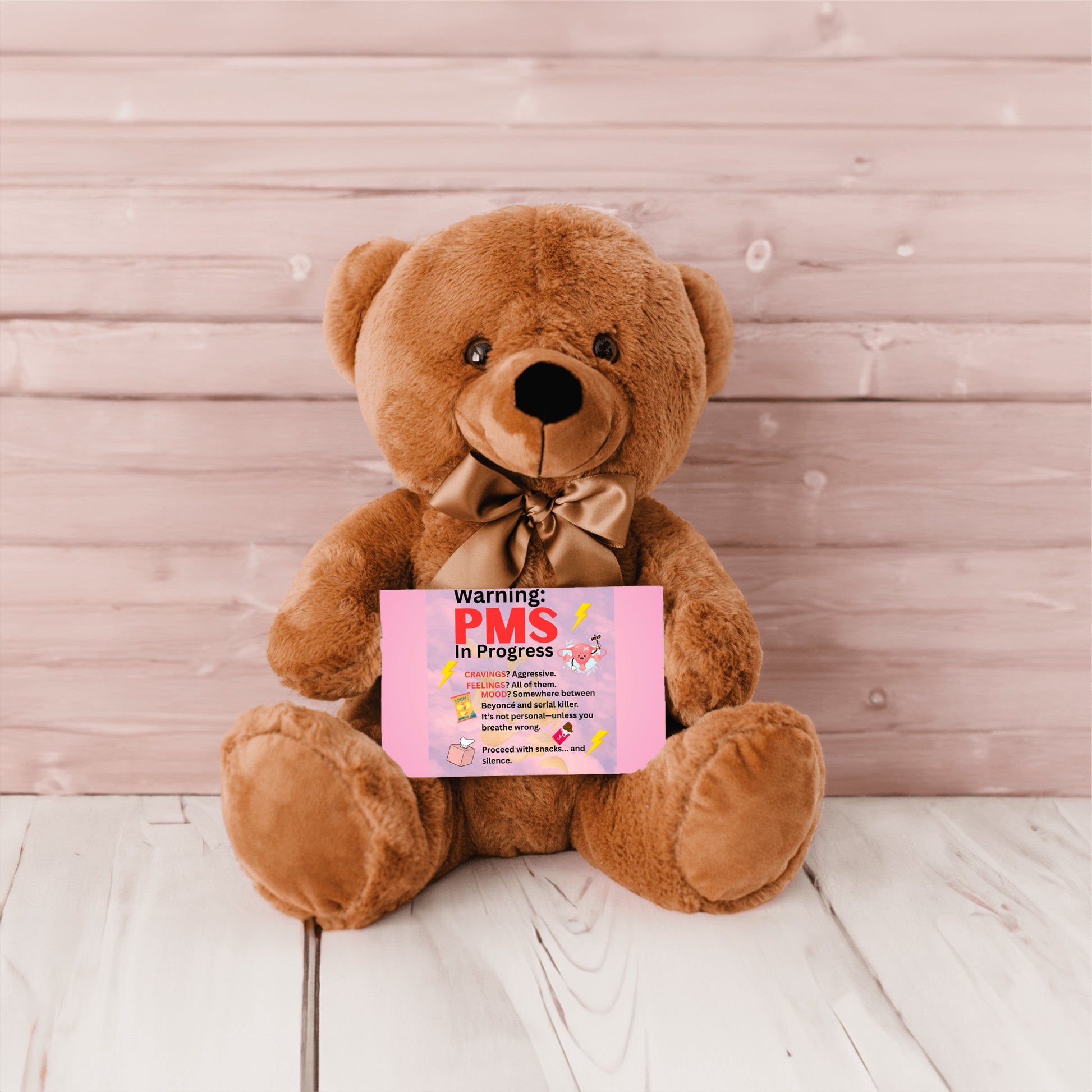 Bold comic-style PMS warning card with a pink storm background, cartoon icons like thunderclouds, chocolate bars, and explosive emojis, delivering a humorous and edgy message.