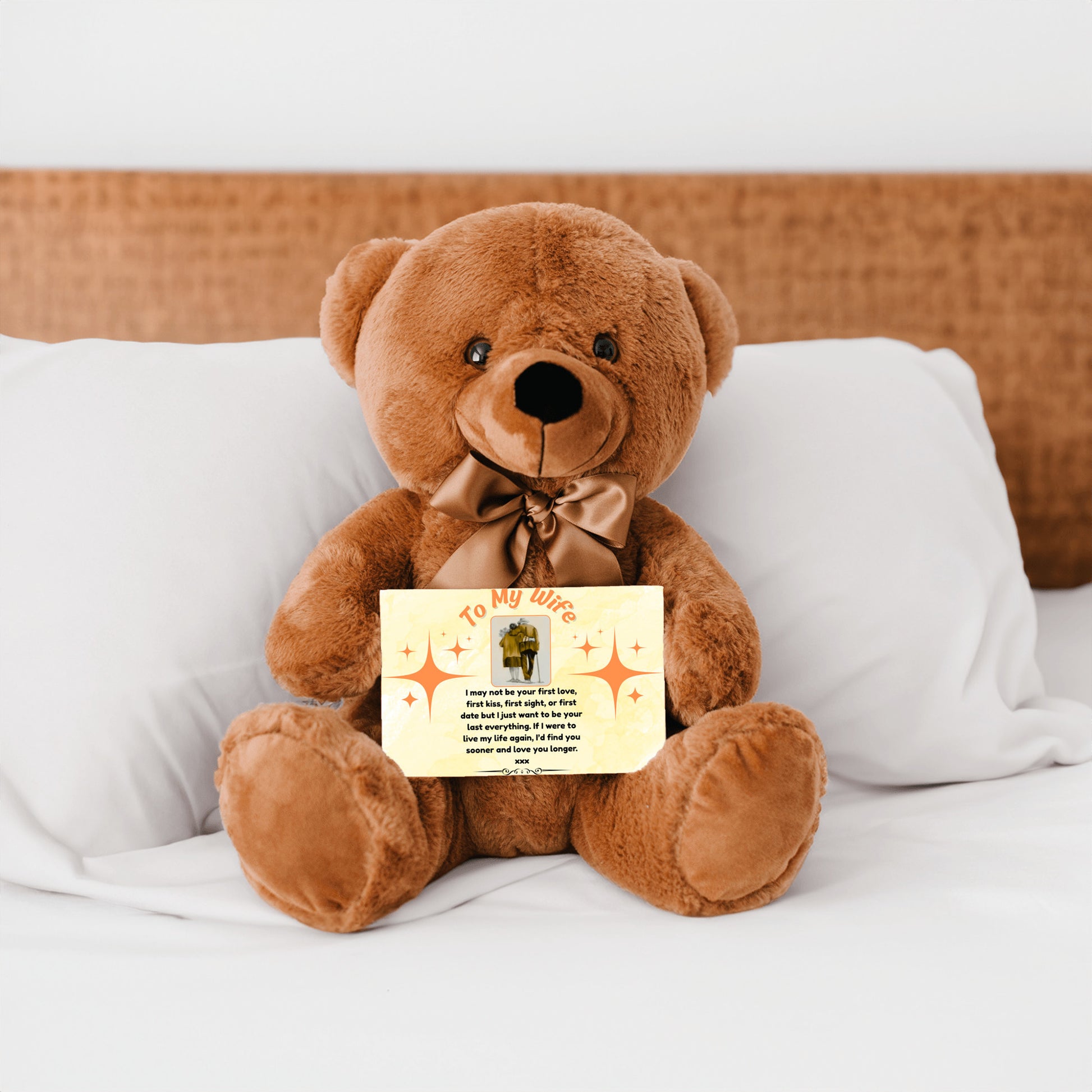 “Adorable plush teddy bear holding a heartfelt message card that reads ‘To My Wife’, designed as a sentimental gift for anniversaries, birthdays, or just because. Perfect for expressing love and appreciation.”