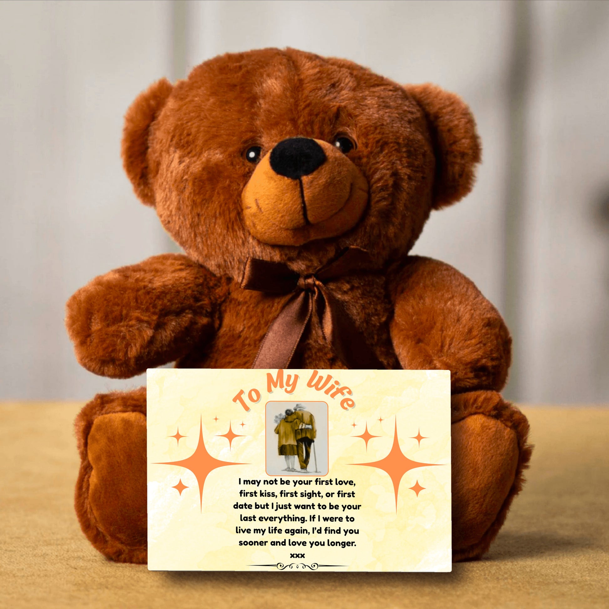 “Adorable plush teddy bear holding a heartfelt message card that reads ‘To My Wife’, designed as a sentimental gift for anniversaries, birthdays, or just because. Perfect for expressing love and appreciation.”
