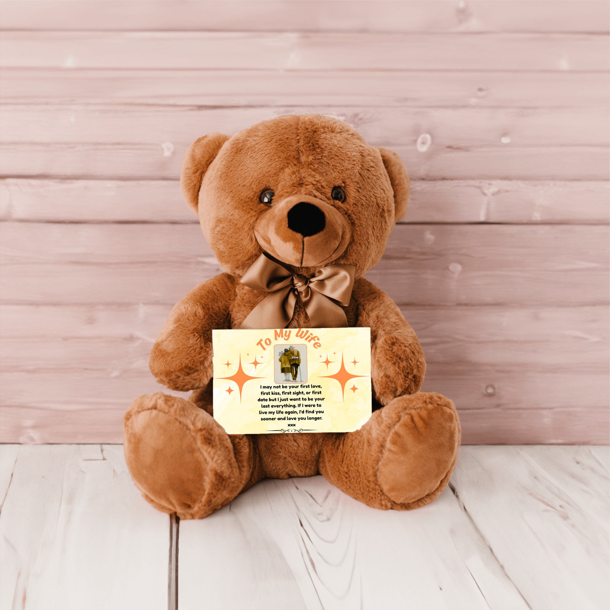 “Adorable plush teddy bear holding a heartfelt message card that reads ‘To My Wife’, designed as a sentimental gift for anniversaries, birthdays, or just because. Perfect for expressing love and appreciation.”