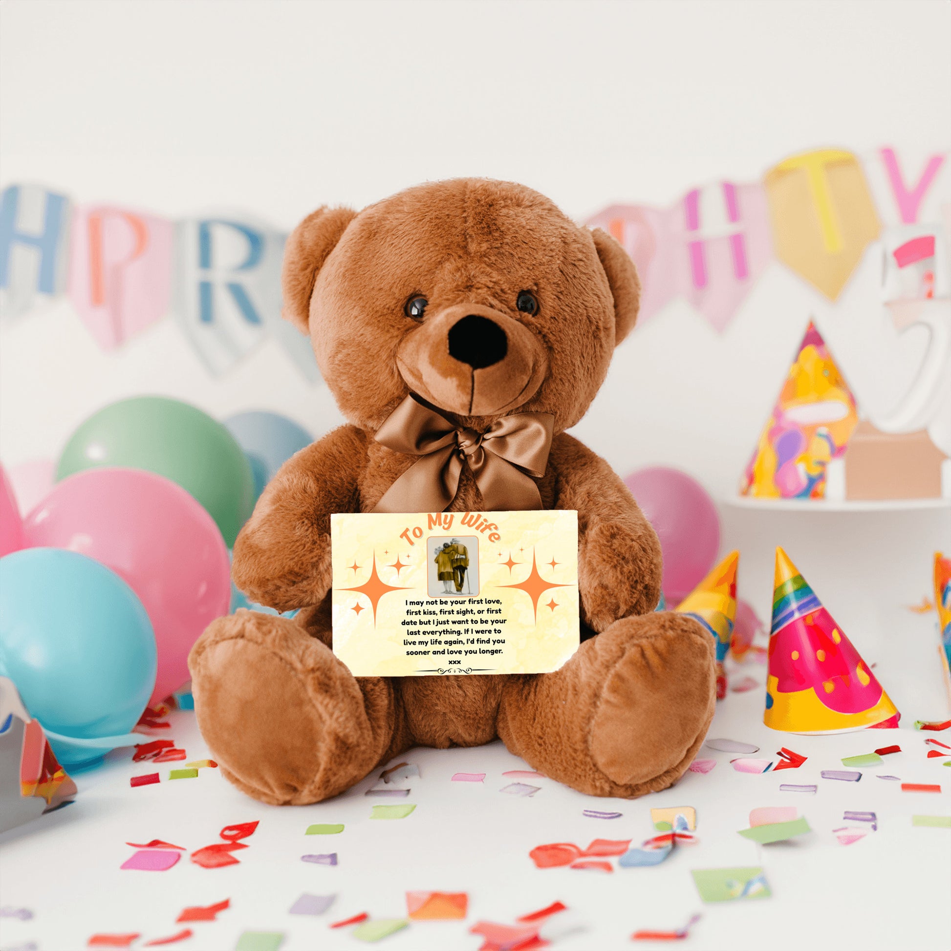 “Adorable plush teddy bear holding a heartfelt message card that reads ‘To My Wife’, designed as a sentimental gift for anniversaries, birthdays, or just because. Perfect for expressing love and appreciation.”