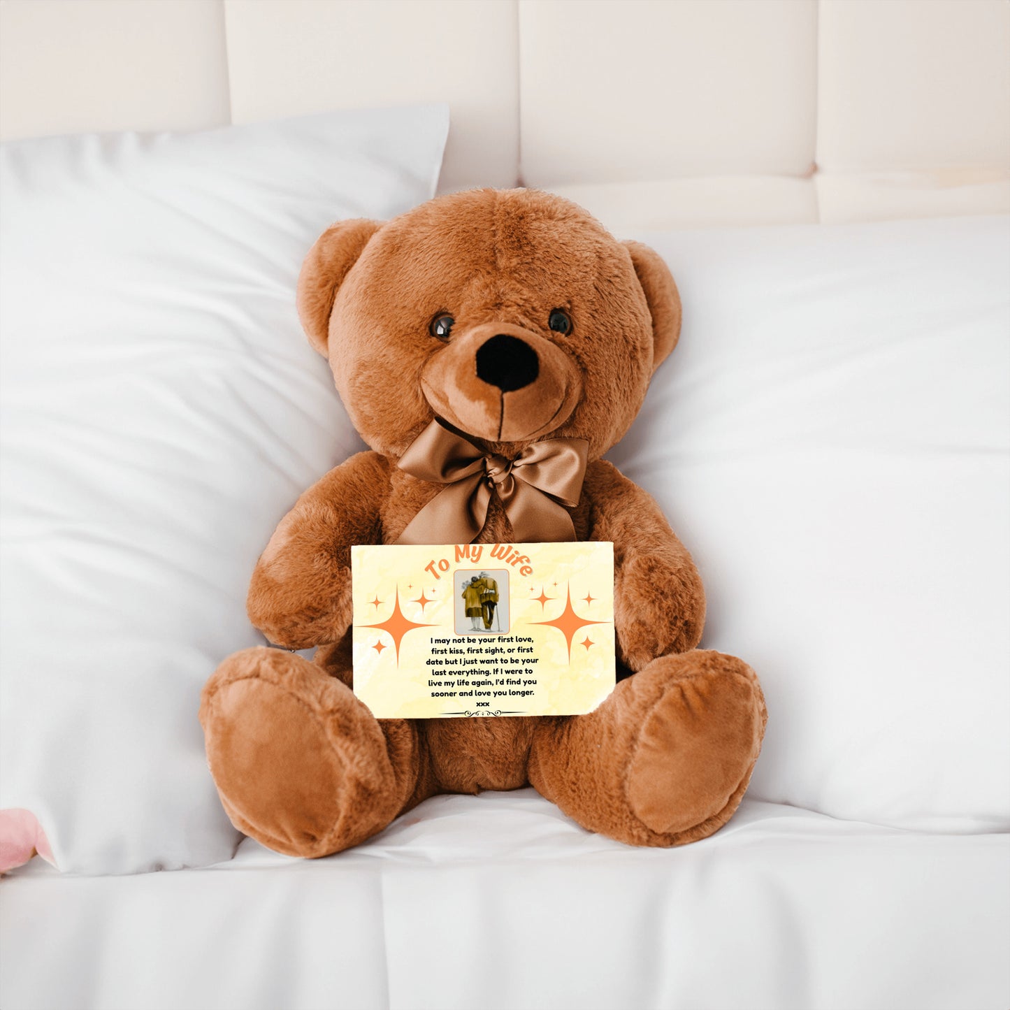 “Adorable plush teddy bear holding a heartfelt message card that reads ‘To My Wife’, designed as a sentimental gift for anniversaries, birthdays, or just because. Perfect for expressing love and appreciation.”