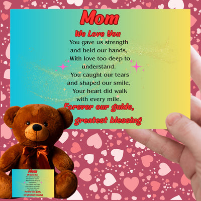 "Plush teddy bear holding a card with the message 'Mom, We Love You – Forever Our Guide' on a pink floral background."