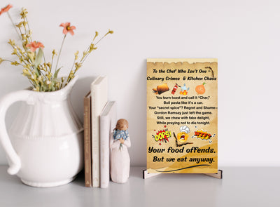  “Kitchen-themed plaque with bold text and a humorous design.”