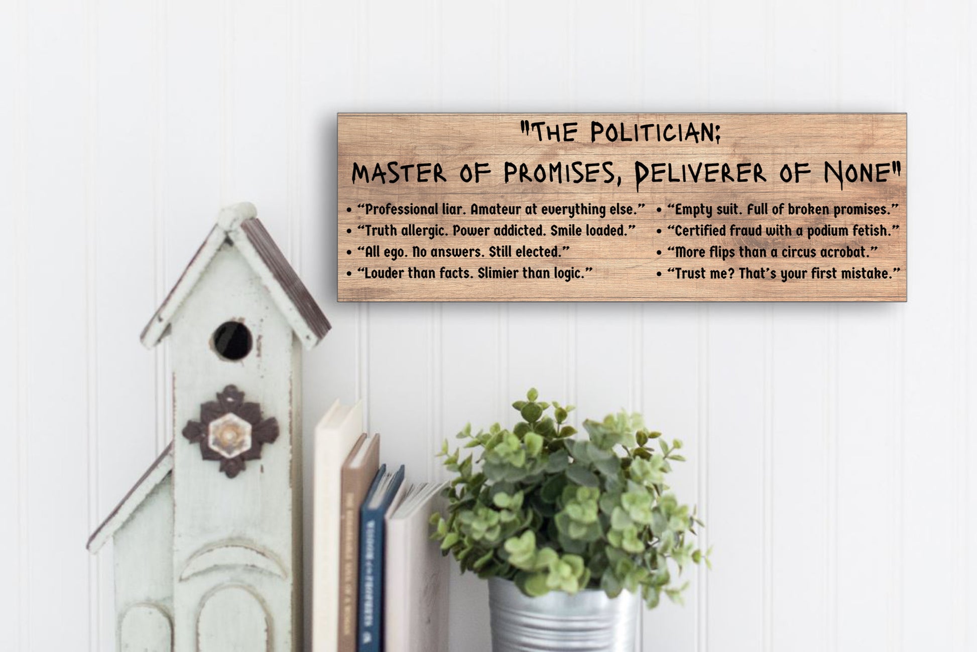 A satirical plaque titled "The Politician," featuring a caricature of a grinning politician with crossed fingers behind his back, surrounded by broken promises.