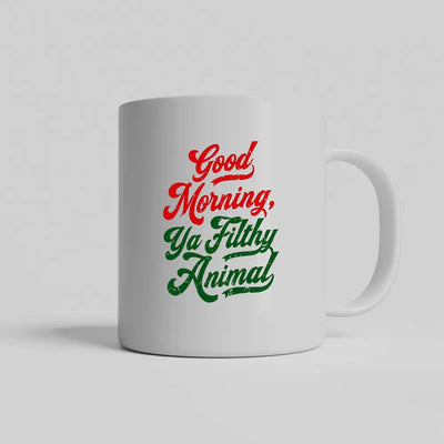 White ceramic mug that says “Good Morning, Ya Filthy Animal” in bold black font – perfect for sarcastic coffee lovers.