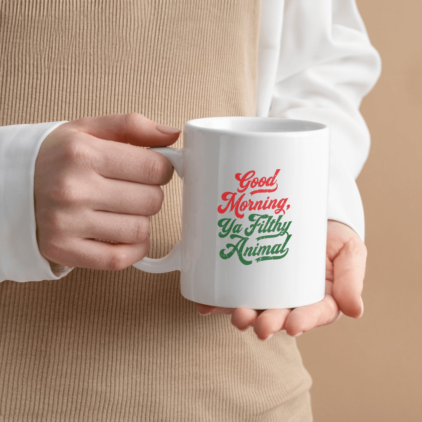 White ceramic mug that says “Good Morning, Ya Filthy Animal” in bold black font – perfect for sarcastic coffee lovers.
