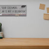 Funny bartender plaque that reads “Dear Customers: The Tip Jar Is Not Just a Decoration”