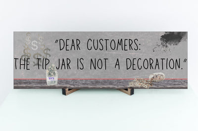 Funny bartender plaque that reads “Dear Customers: The Tip Jar Is Not Just a Decoration”