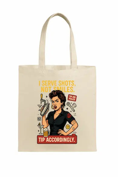 Bartender-inspired tote bag with bold text “I Serve Shots Not Smiles” printed in striking black font.