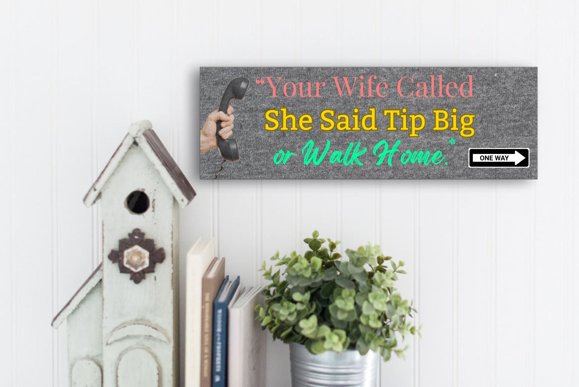 Funny bartender plaque that reads “Your Wife Called. She Said Tip Big or Walk Home” in bold neon letters.