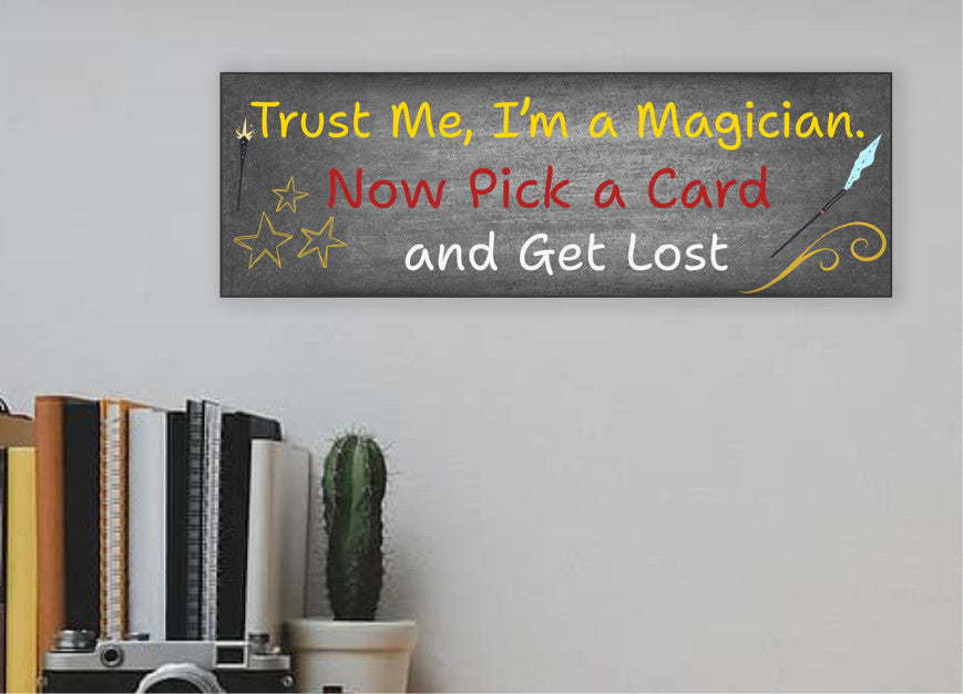 Sarcastic magician-themed plaque with the quote “Trust Me, I’m a Magician – Now Pick a Card and Get Lost” in vintage typeface on a bold backdrop.
