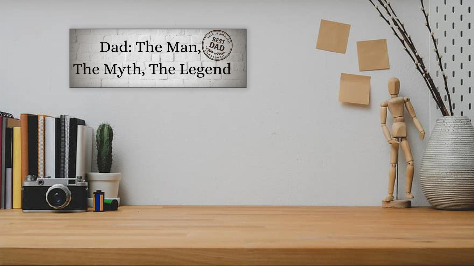 “Funny plaque that reads: Dad – The Man, The Myth, The Legend.”