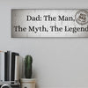 “Funny plaque that reads: Dad – The Man, The Myth, The Legend.”