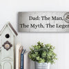 “Funny plaque that reads: Dad – The Man, The Myth, The Legend.”