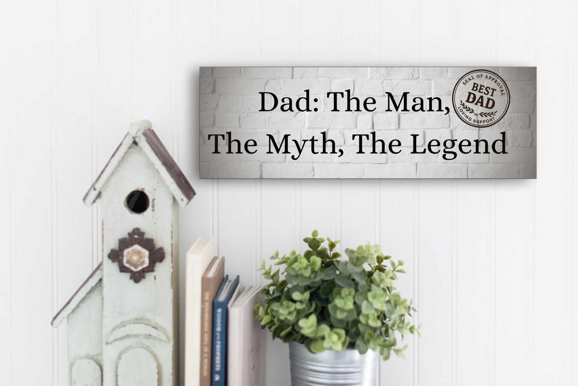 “Funny plaque that reads: Dad – The Man, The Myth, The Legend.”