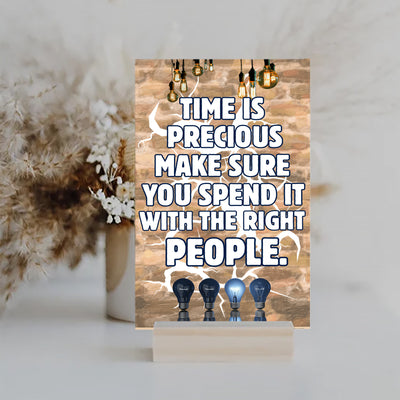Emotional quote plaque reading “Time Is Precious” in soft script on neutral wood background, styled in a cozy living room setting with natural light.