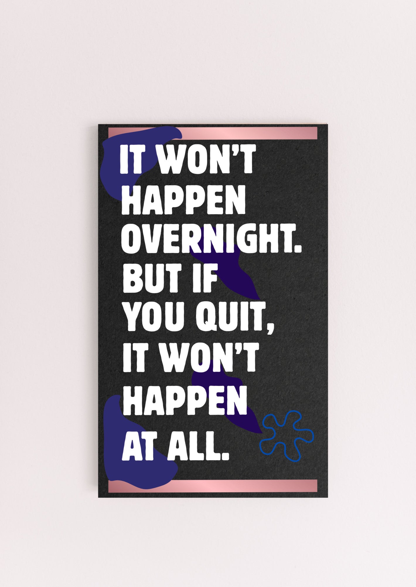 A decorative wood plaque with bold, distressed text reading “It Won’t Happen Overnight,” featuring a minimalist style and comic flair.