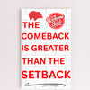 Motivational wall plaque with bold quote: “The Comeback Is Greater Than The Setback” in clean black-and-white print on wood, styled in a home office space.