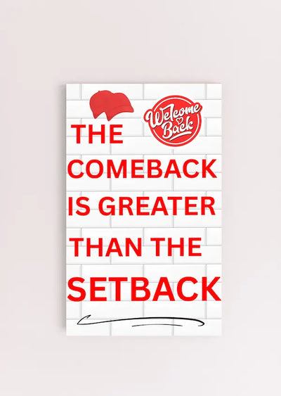 Motivational wall plaque with bold quote: “The Comeback Is Greater Than The Setback” in clean black-and-white print on wood, styled in a home office space.