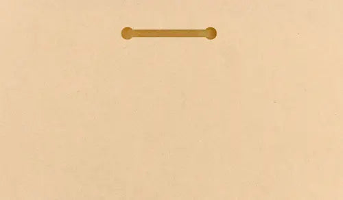 A modern wall plaque that reads “Comfort Is the Enemy of Growth” in bold, minimalist black letters on a clean woodgrain background.