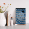 Inspirational quote plaque reading “Successful People Are Not Gifted, They Just Work Hard, Then Succeed On Purpose” in bold, modern typeface