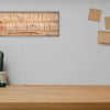 Funny quote plaque with “Everything Happens for a Reason” in bold sarcastic font, mounted on rustic wood-style background.