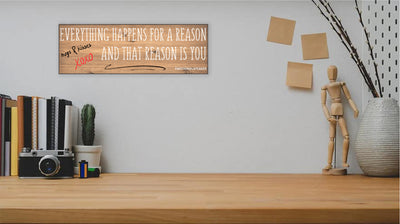 Funny quote plaque with “Everything Happens for a Reason” in bold sarcastic font, mounted on rustic wood-style background.