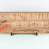 Funny quote plaque with “Everything Happens for a Reason” in bold sarcastic font, mounted on rustic wood-style background.