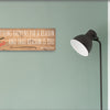 Funny quote plaque with “Everything Happens for a Reason” in bold sarcastic font, mounted on rustic wood-style background.