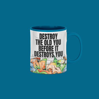 White ceramic mug printed with bold black text reading “Destroy The Old You” in a modern, minimal font on a clean backdrop.